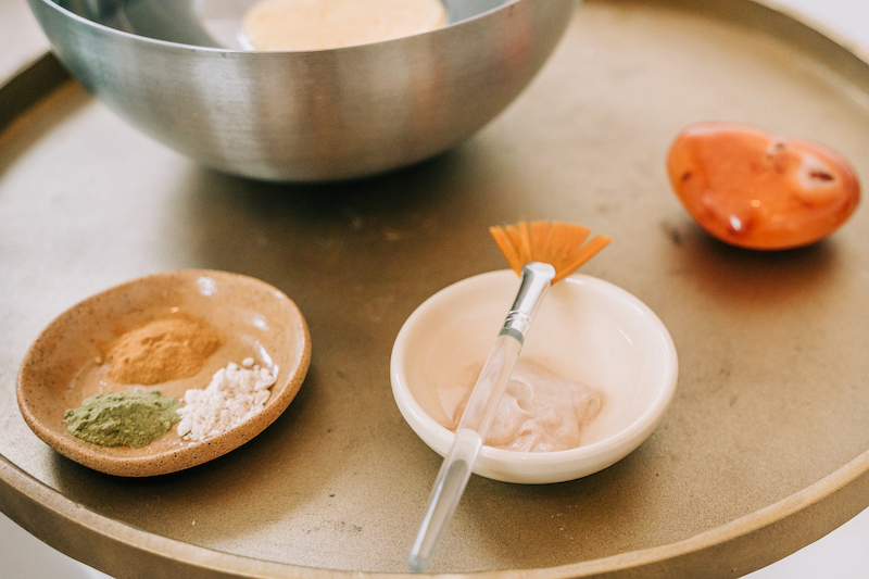 Plant-based facial treatment ingredients and tools used at Beauty Republic Tucson